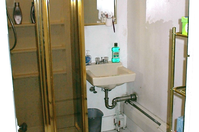 Bathroom - Very large open floor plan with vaulted ceilings in living room Apartments