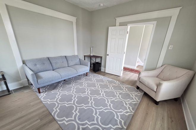 Living Room - 3552 Woodburn Ave — Rooms for Rent, Newly Renovated, 1 Block from  Xavier House