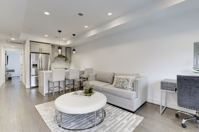 Living room and kitchen - $2750 1 Bed/1Bath, Reserved Parking included, W/D in unit, Elfa Closets, Renovated finishes