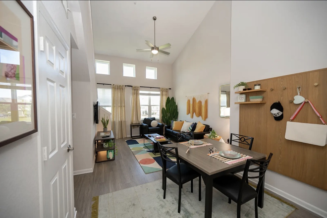 Living room - The Lofts 4x4 $999 and First month is on me!