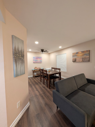 Living Room - Woodlands Apartment Complex. 1 bed 1 bath. Fully furnished. Parking + utilities included.