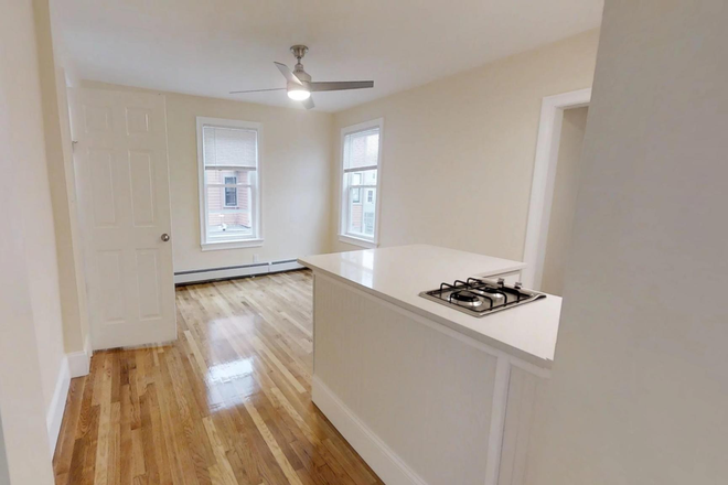 Visit hubrealtyproperties.com - Beautiful 1 bedroom with breakfast bar, laundry in unit, next to Porter Square T