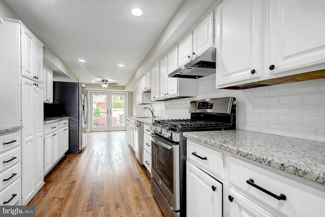 kitchen with view to backyard - Renovated  LITTLE ITALY townhouse