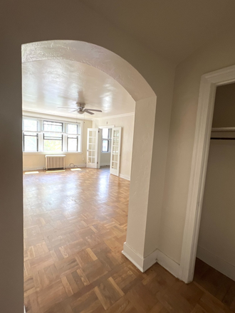 Entrance to Coat Closet & Living Room - Phillips Avenue Apartments