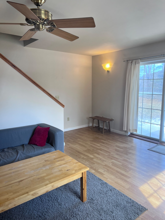 Living area exit to back yard - Two Bedroom Townhouse