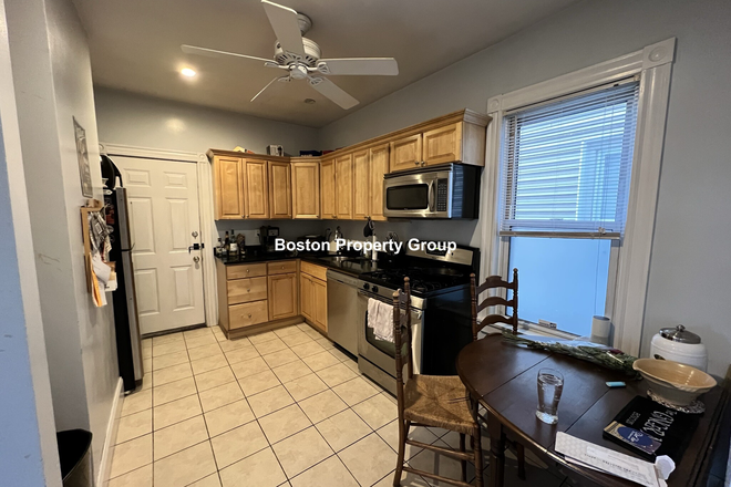 Kitchen - Spacious 3-bed apartment with in-unit laundry and parking included!