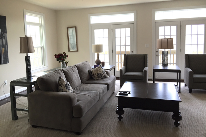 The Living Room - Spacious Master Bedroom Suite w/ Private Bath in Metro-Accessible Luxury Townhome