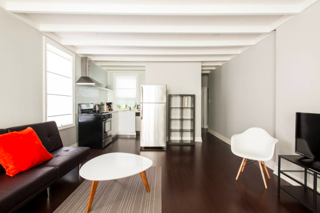Living room kitchen - Fully Furnished 1 Bedroom In Family Friendly Little Italy Walking Distance to UofT