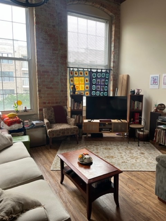 Photo of the living room, which faces West. - Erwin Mills Apartments