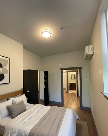 Sleeping area - Fully Furnished Studio Available One Block from Peabody Shuttle Stop Apartments