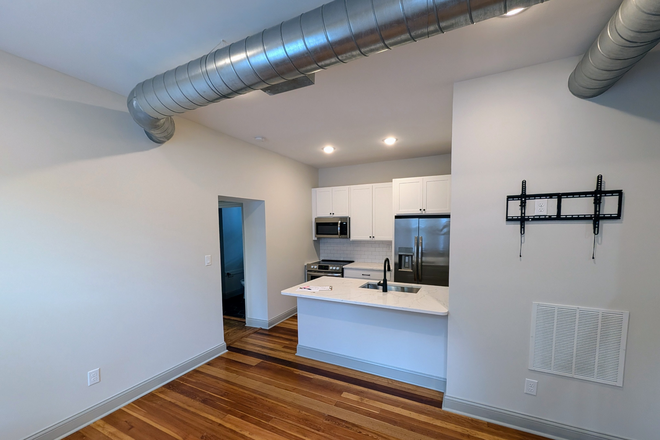 Living Room - Beautiful Remodel, Steps from Xavier University, In-Unit Washer/Dryer, 3 Full Baths Duplex