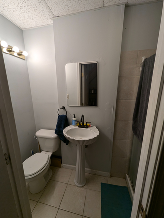 Main floor bathroom - One bedroom behind Wyman Park Building Townhome