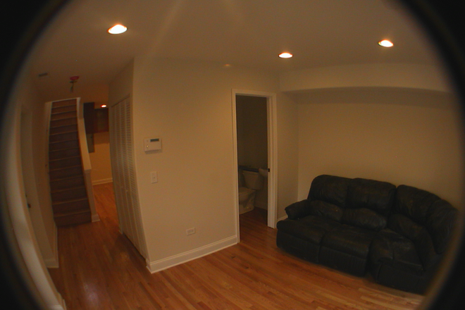 Living Room with access to Half Bath - $800 a month- 1 Bedroom in East-Pilsen 3 floor House- Available 8/15/2026