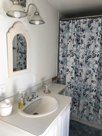 Bathroom main floor. - 1 bedroom available - 4 bdrm/2 bath shared house. Furnished