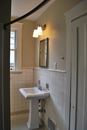Bathroom with linen closet and tiles - Large Duplex close to campus Duplex