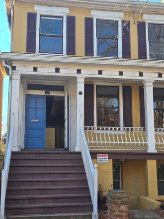 Photo - A historic, fully renovated Postal Workers Union House preserved character, with modern new