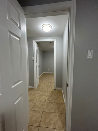 Bedroom 1 looking into bedroom 2 - Private 2 bedroom newly renovated rooms for rent Triplex