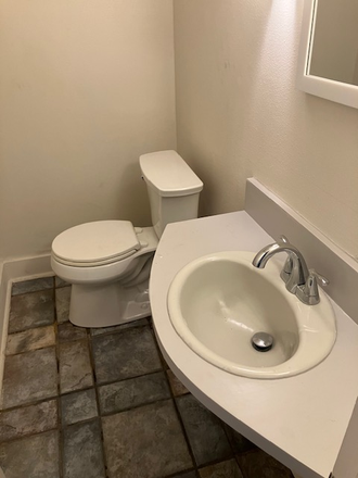 Bathroom newly renovated - Newly Renovated Property Close to Campus Triplex