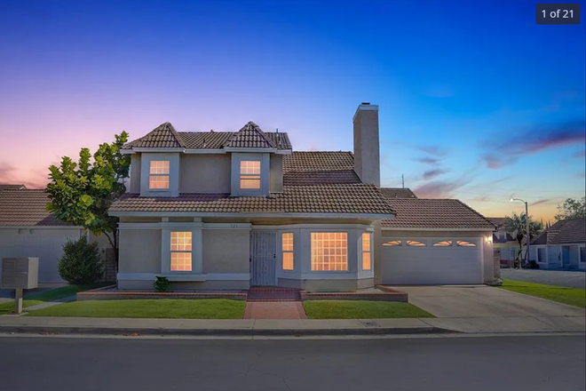 Front of the house - In a two-story home, I rent two bedrooms, master bedroom for $1,500 and the other room for $1,300