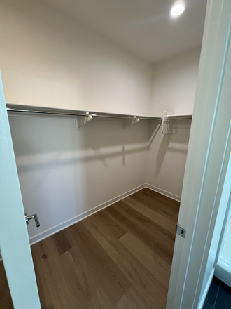 primary walk-in closet - 3Roots Stellar Townhome