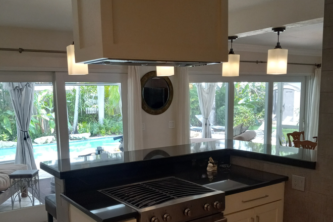 Fully equipped gourmet  kitchen. - Luxurious tropical pool home to share near Nova University.