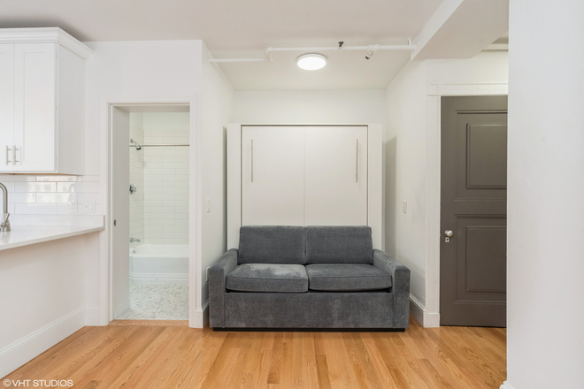 bed - Studio In Symphony Apartments