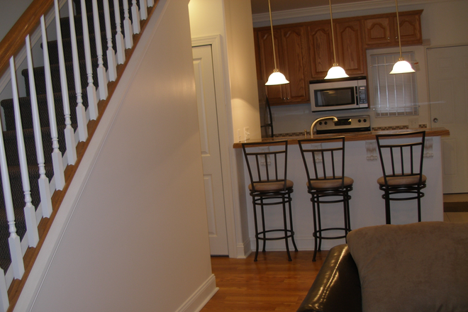 view of kitchen from living room - Two Bedrooms Available on Second Floor House