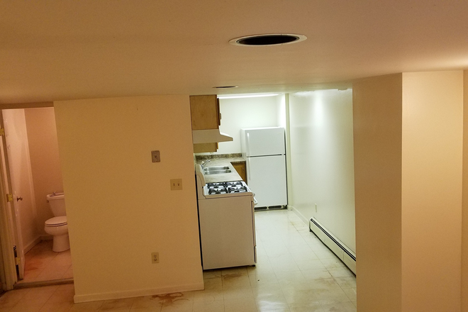 living room to kitchen view - 102 Hawley Street # BASEMENT - 1 Bedroom (Northampton)