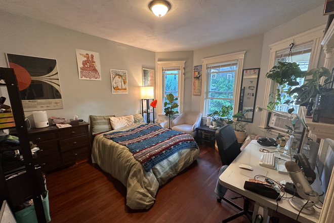 Bedroom 1 - 3bd/1ba with lots of space & easy NEU transit. My roommates are leaving and looking to stay here.