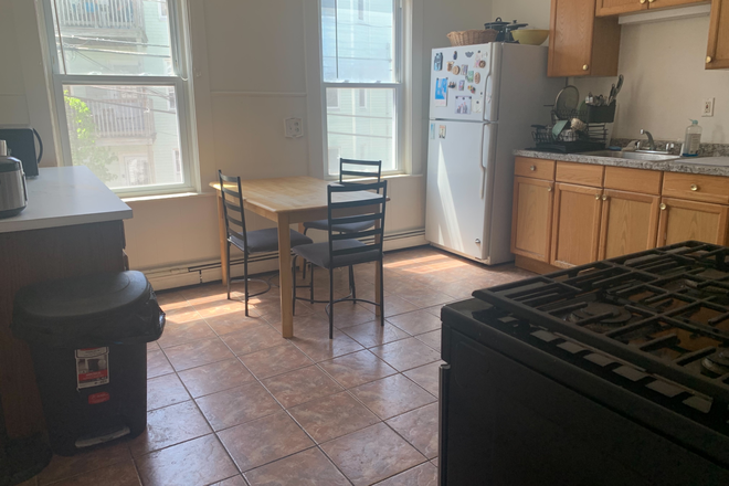 Kitchen, another view - Furnished 4BR/1BA. av.06.01 or 09.01.26 for a summer or a long-term, T, bus, and shops. Apartments