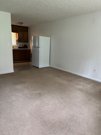 Living room to kitchen - 2 BR, 1 Bath Less than 10 minutes to Liberty Apartments