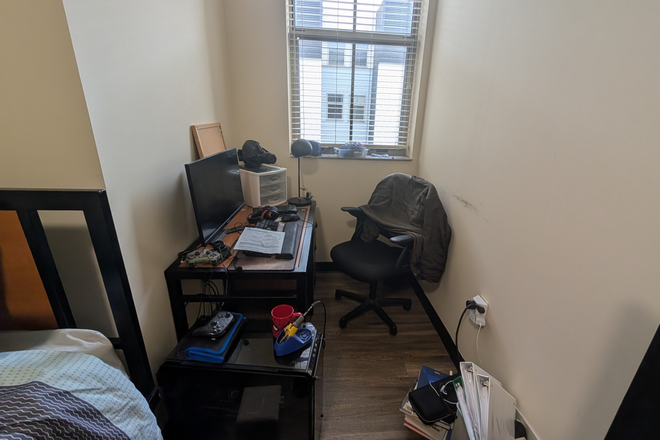 Bedroom (desk/window view) - 8 1/2 Canal Apartments