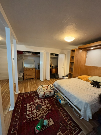 bed is a fold out murphy bed, fold it up for more space! - Quiet Garden Studio Summer Sublet House