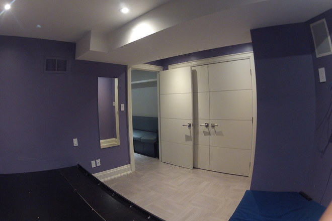 Larger bedroom - it is now painted white - One bedroom in 2BR Basement Suite | Brunswick & Harbord | Includes Internet + Utilities!!