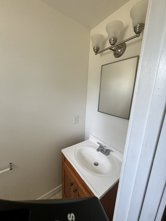 vanity in the 1/2 bath in larger bedroom lasr - 3 Br, 1.5 Bath, House, 2 block Walk to CU BOULDER, 1yr Lease 7/20/2026 Flexible start date