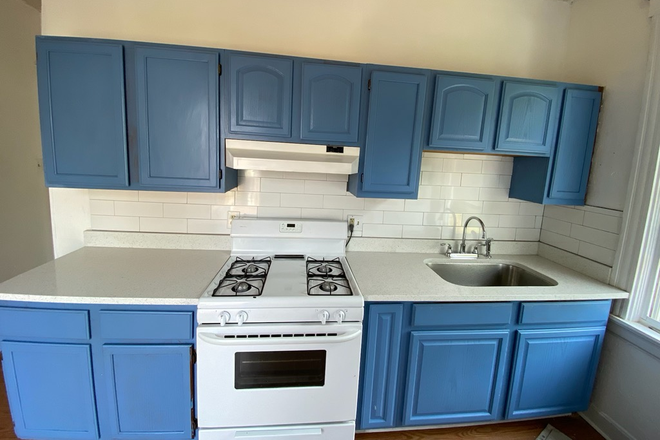 Kitchen with quartz countertops - Huge 3 Bedroom apartment Now Pre-Leasing for 2027 Academic Year! Available August 2027