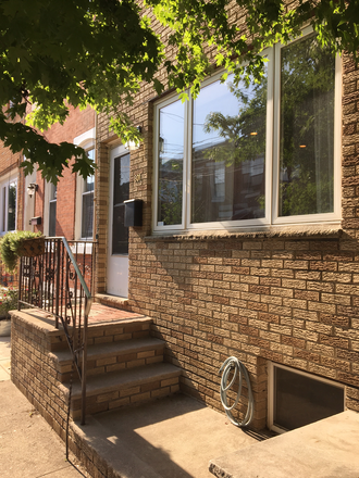 Maple tree in front of house, wonderful for shade. - Bright 2 Bedroom/1 Bath House on a Beautiful Tree Lined Street