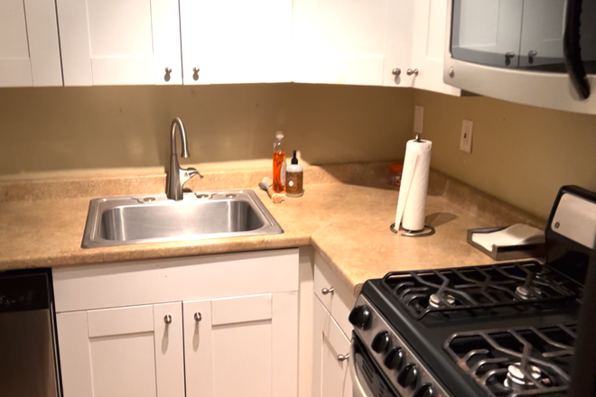 Kitchen - Condo Directly Across From University-Two Bedrooms Available