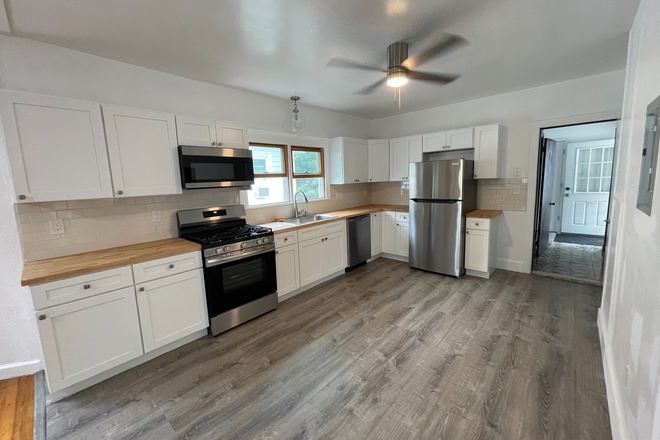 Newly renovated kitchen with new stainless appliances including dishwasher and microwave. - ALL UTILITIES INCLUDED 3 BED 1 BATH MEDFORD TUFTS AREA - NO FEE