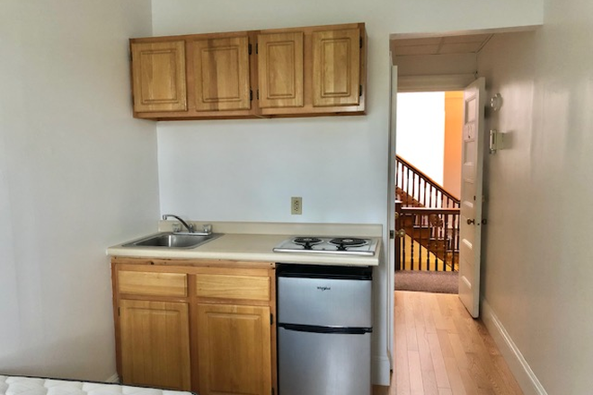 Visit hubrealtyproperties.com - Bright studio, in a great location on the green line T Apartments