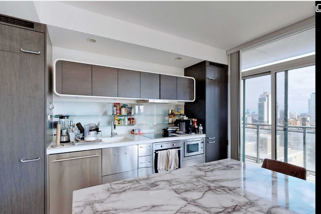 kitchen - Fully Furnished 1 Bedroom + Large Den Condo Near University of Toronto
