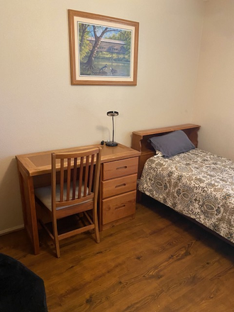 Twin bed and desk with chair - Private furnished room. Shared bathroom. Female only. Shared house.