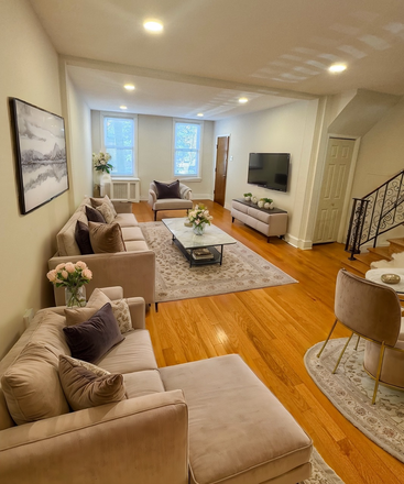 Living Room - 3 Bedroom Bi-level. 1705 S 11th Street Apartments