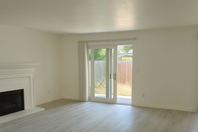 living room - Available Now! Just renovated, Beautiful Kitchen, private yard by Baseline and Foothills Apartments