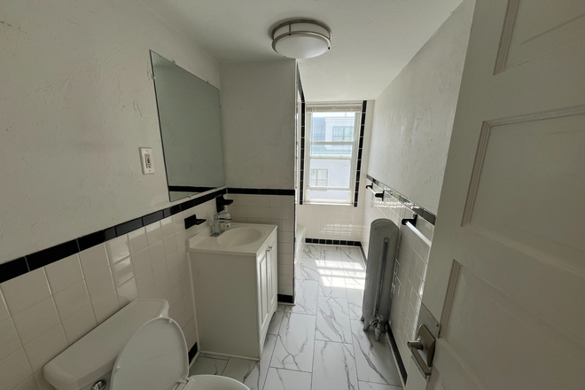Bathroom - Two bedrooms available, 15 minute walk from campus, near grocery Apartments