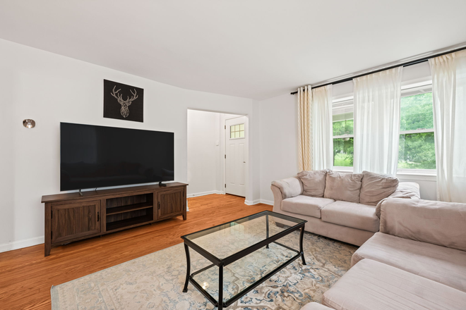 Living Room - Spacious 3 Bedroom + Office W/ Parking! Townhome