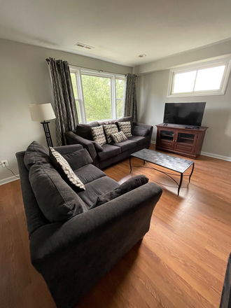 Living Room View 2 - 1007 Woodson FURNISHED ONE BEDROOM Apartments