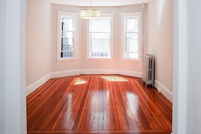 Living Room - September 1, awesome updated 3 bed in Jeffries Point! Apartments