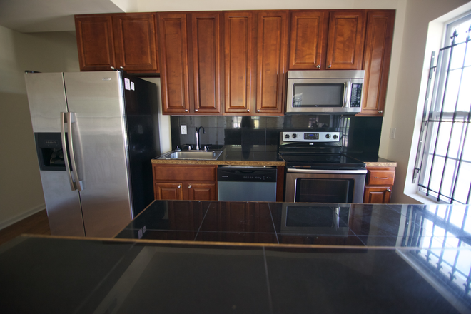 Kitchen - OCP - Bright and spacious 3 Bed 3 Bath In Safest Location Off Campus Apartments