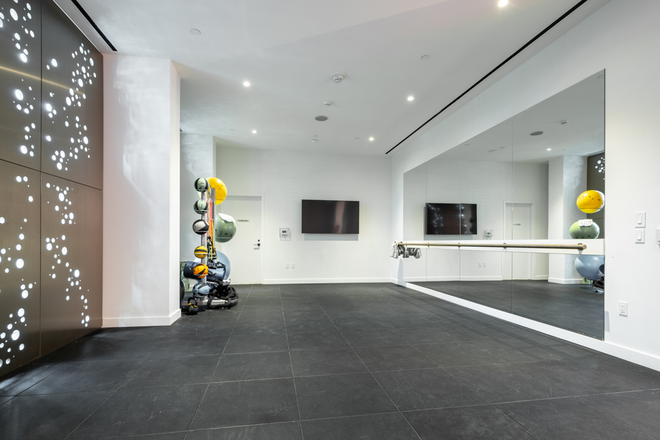 Gym - yoga studio - Furnished 1-Bedroom + Large Den/2-Bath Condo with Direct Subway Access at Yonge & Eglinton